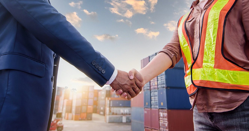 Two persons shaking hand with each other